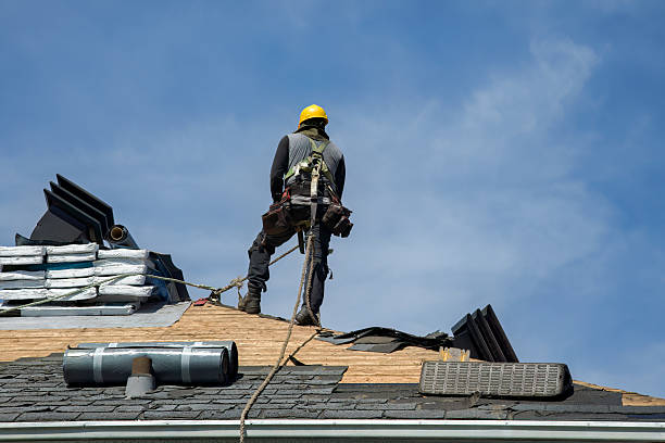 Professional Roofing technician working in Olyphant, PA